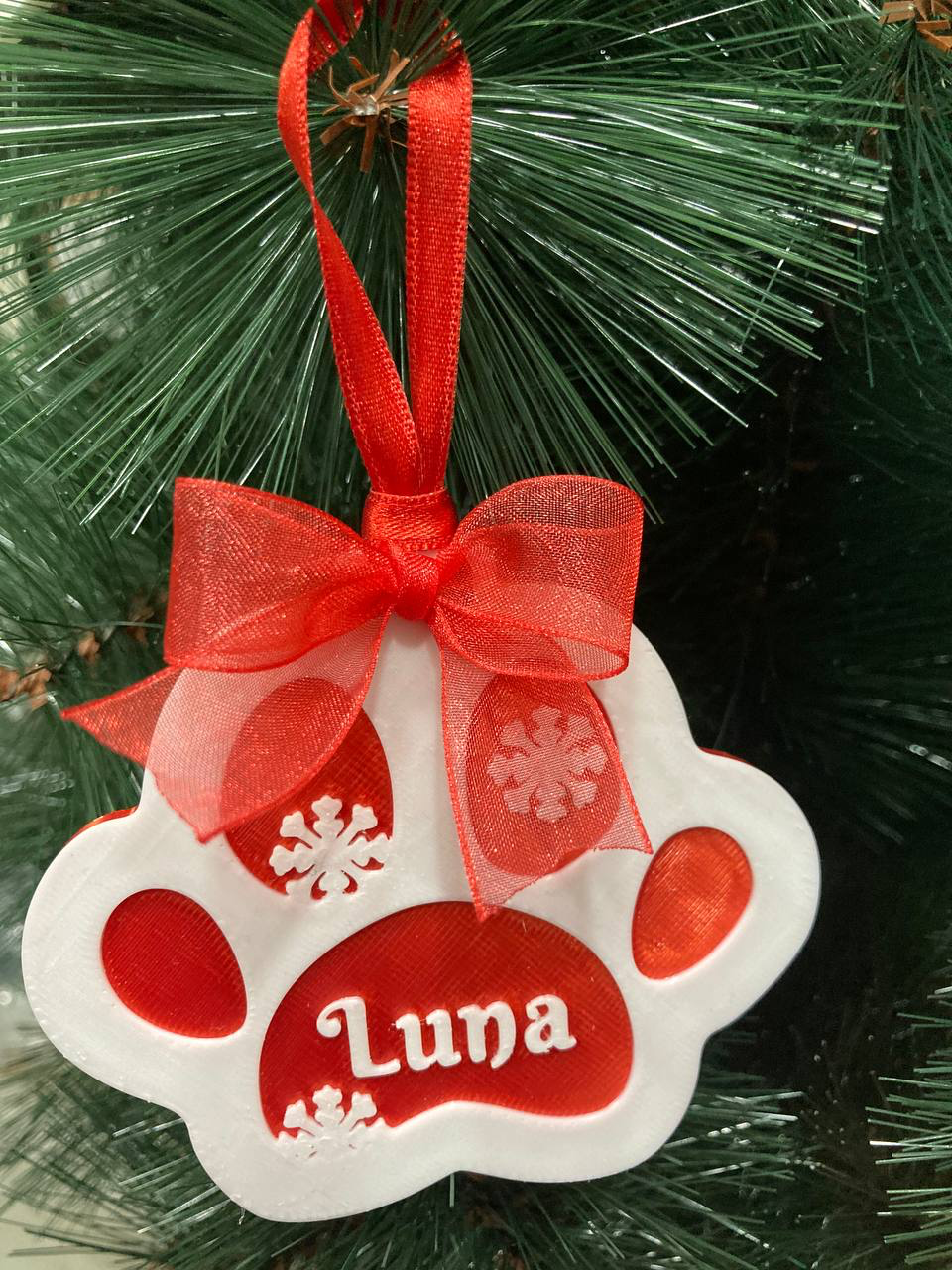 Adorno huella navideña